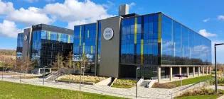 IRR South building outside with a blue sky