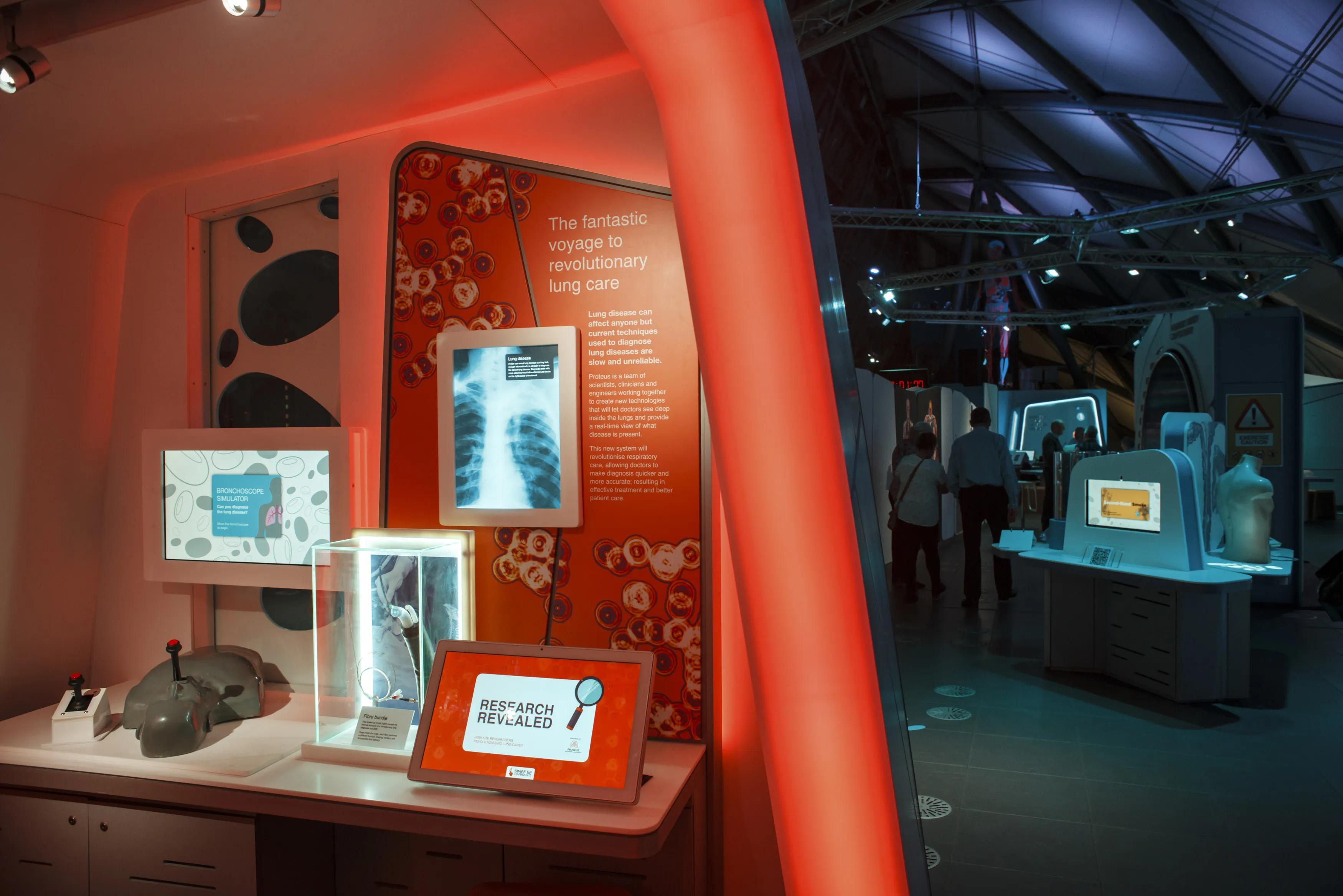 The Proteus Research Capsule consists of a bronchoscope game and a visual display of information about the research