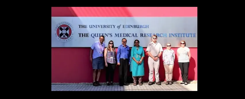 Two visiting doctors from Aravind Eye Care System, Madurai, India, stand outside QMRI with Prof Kev Dhaliwal and Dr Beth Mills