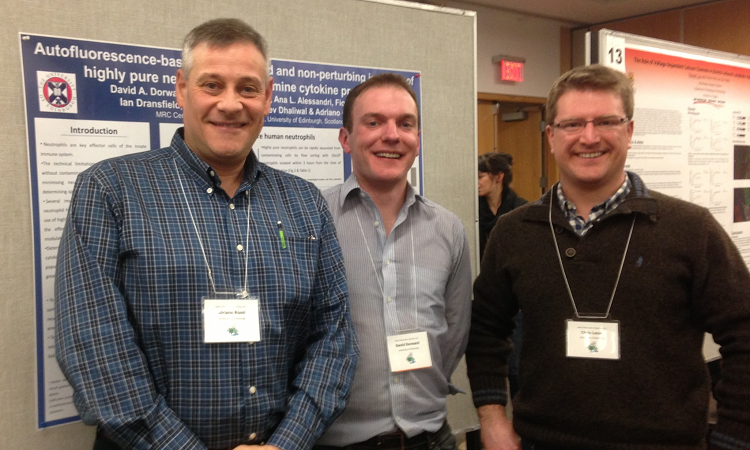 Image of Chris Lucas beside prize poster