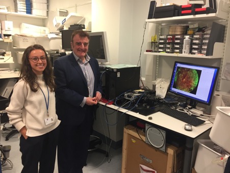 Tommy Sheppard and Helen Parker stand in a Proteus lab