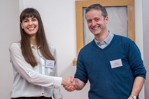 Donald J Davidson presenting the \"Excellence in Public Engagement\" award to Maria Panagopoulou 