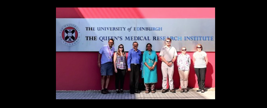 Two visiting doctors from Aravind Eye Care System, Madurai, India, stand outside QMRI with Prof Kev Dhaliwal and Dr Beth Mills